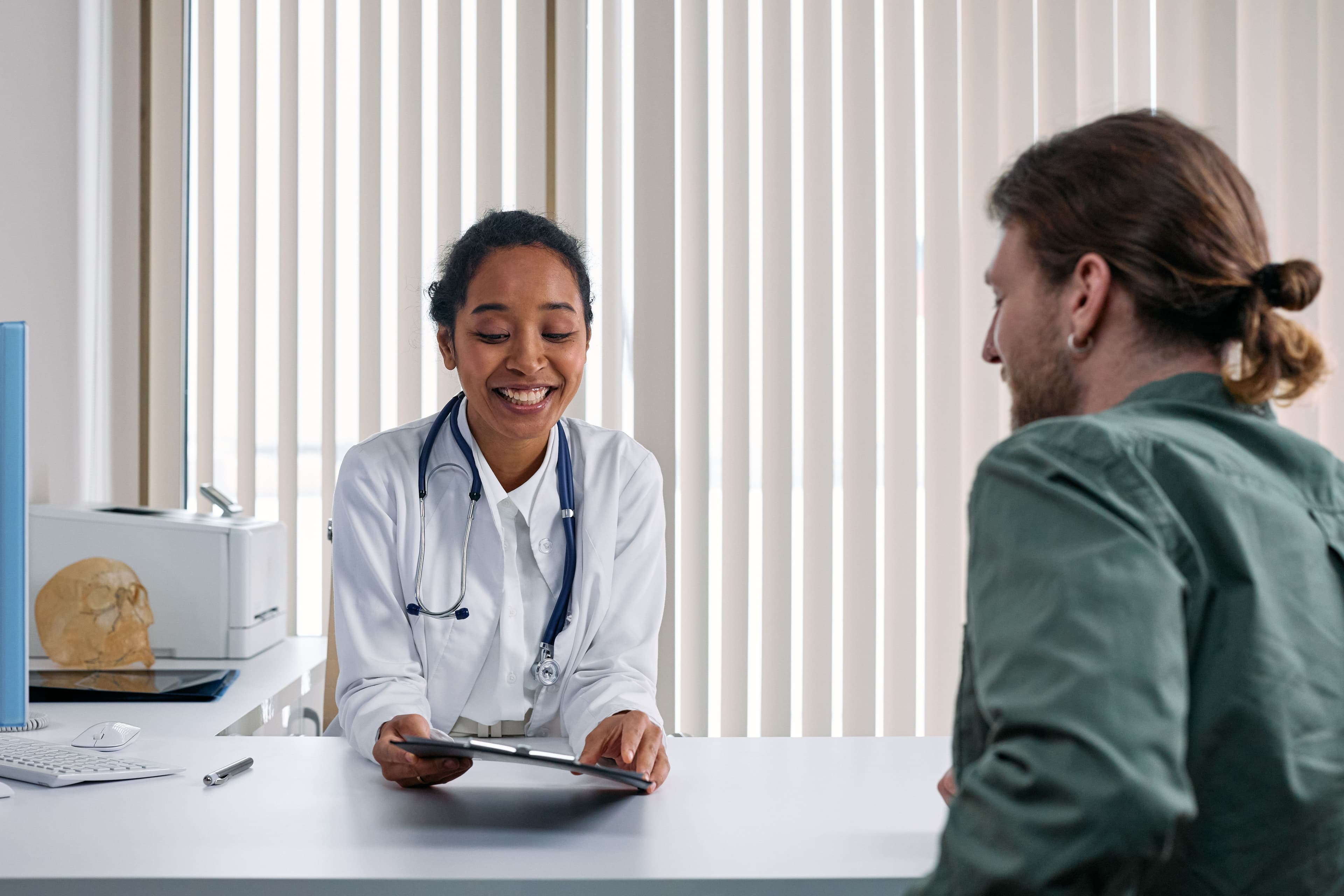 A doctor and patient engaging in a positive consultation