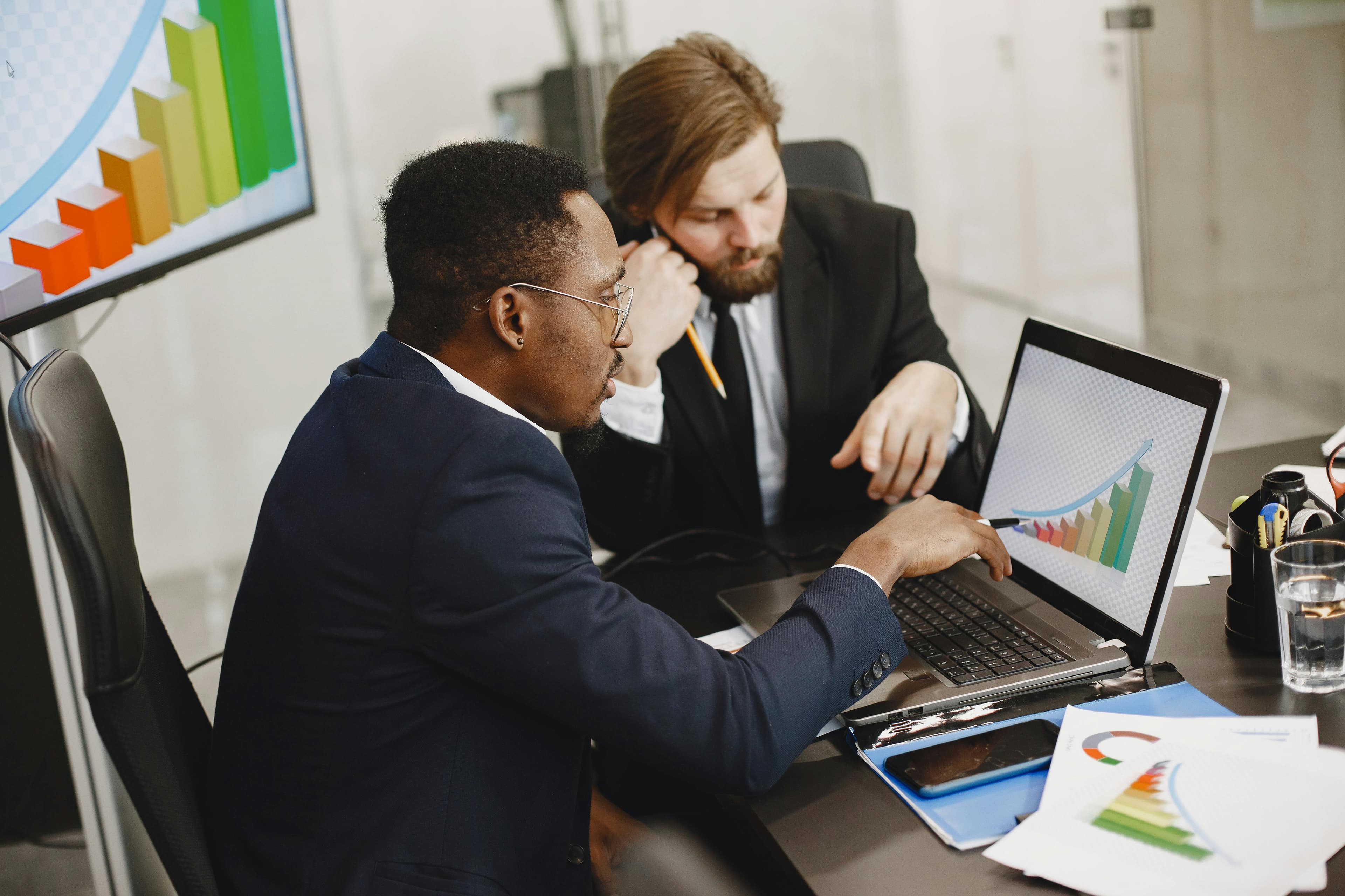 Men Sitting at Office and Working